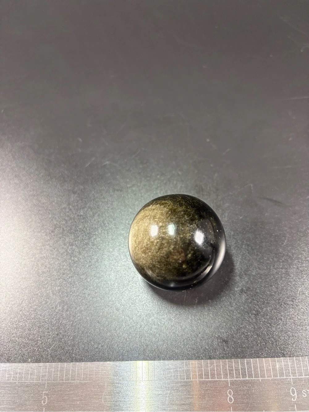 Black gemStone Sphere comes with copper ring and gemstone